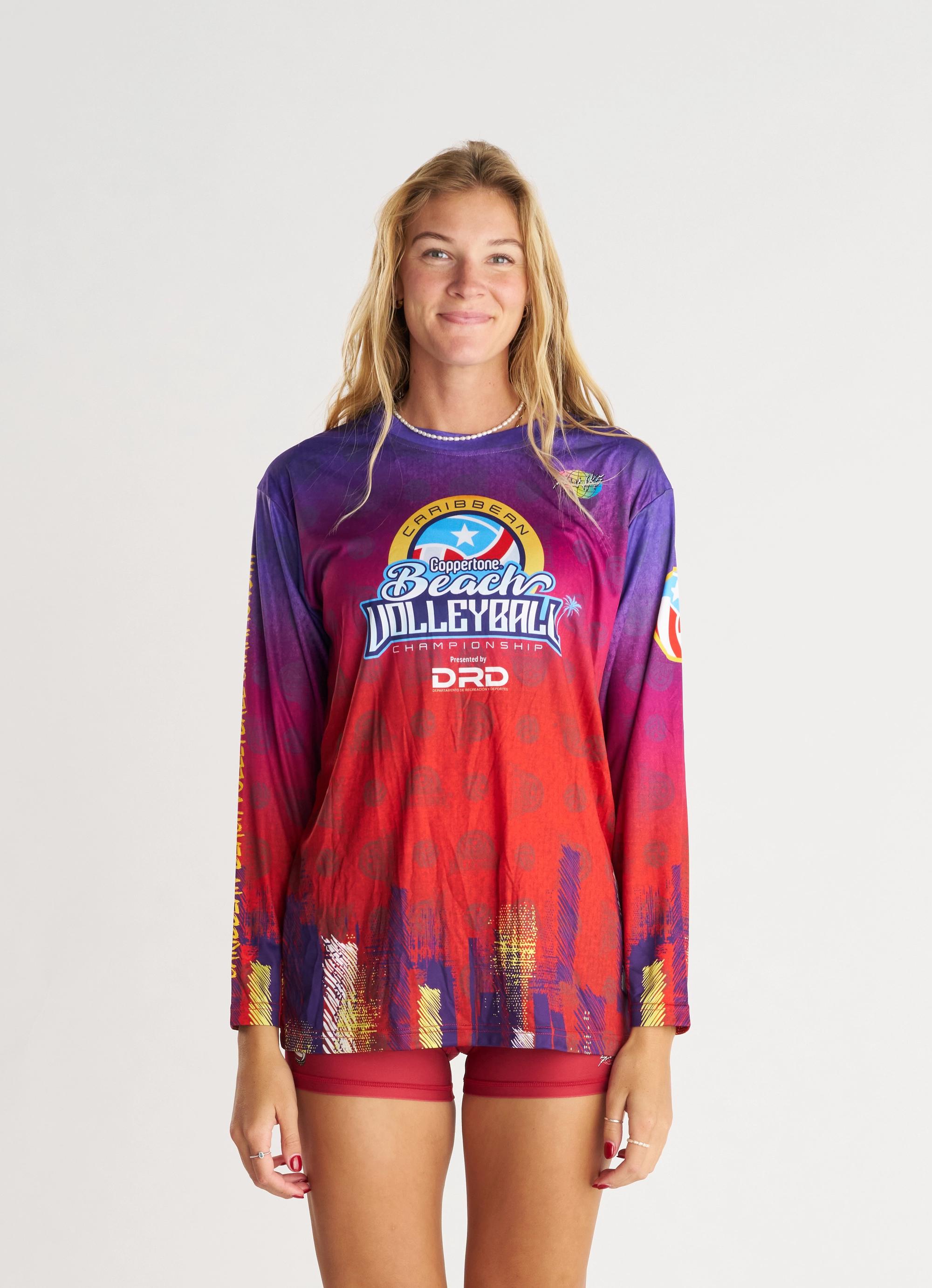 long sleeve warm up jersey on woman wearing matching spandex. purple and red gradient graphic