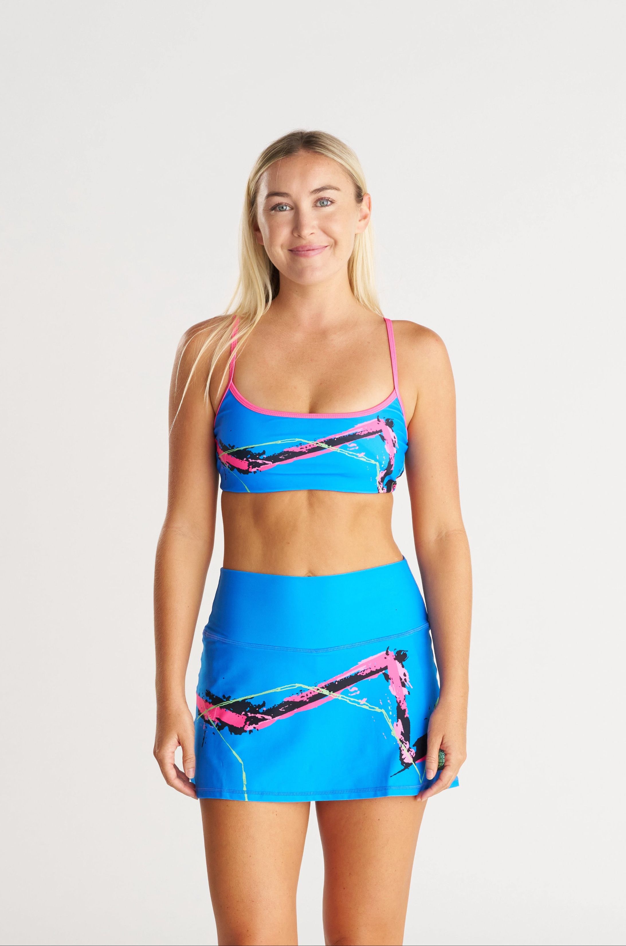 bright blue graphic skirt with matching sports bra