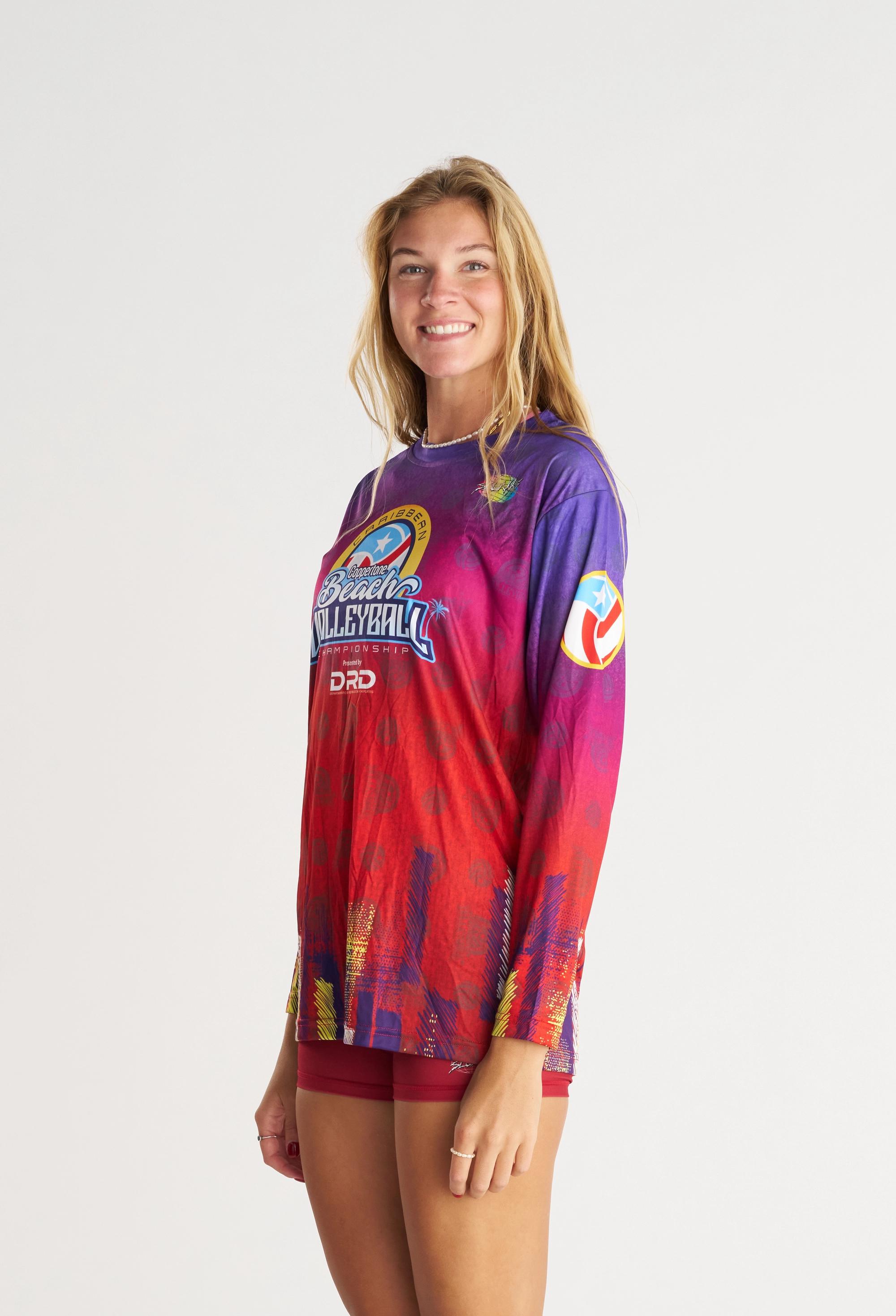 long sleeve warm up jersey on woman wearing matching spandex. purple and red gradient graphic
