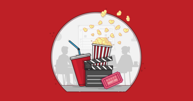 Scrum team looking at a screen with popcorn, movie ticket, directors marker and soda.
