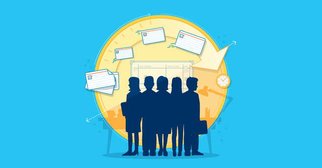 Coworkers standing in circle with user story cards over their heads.