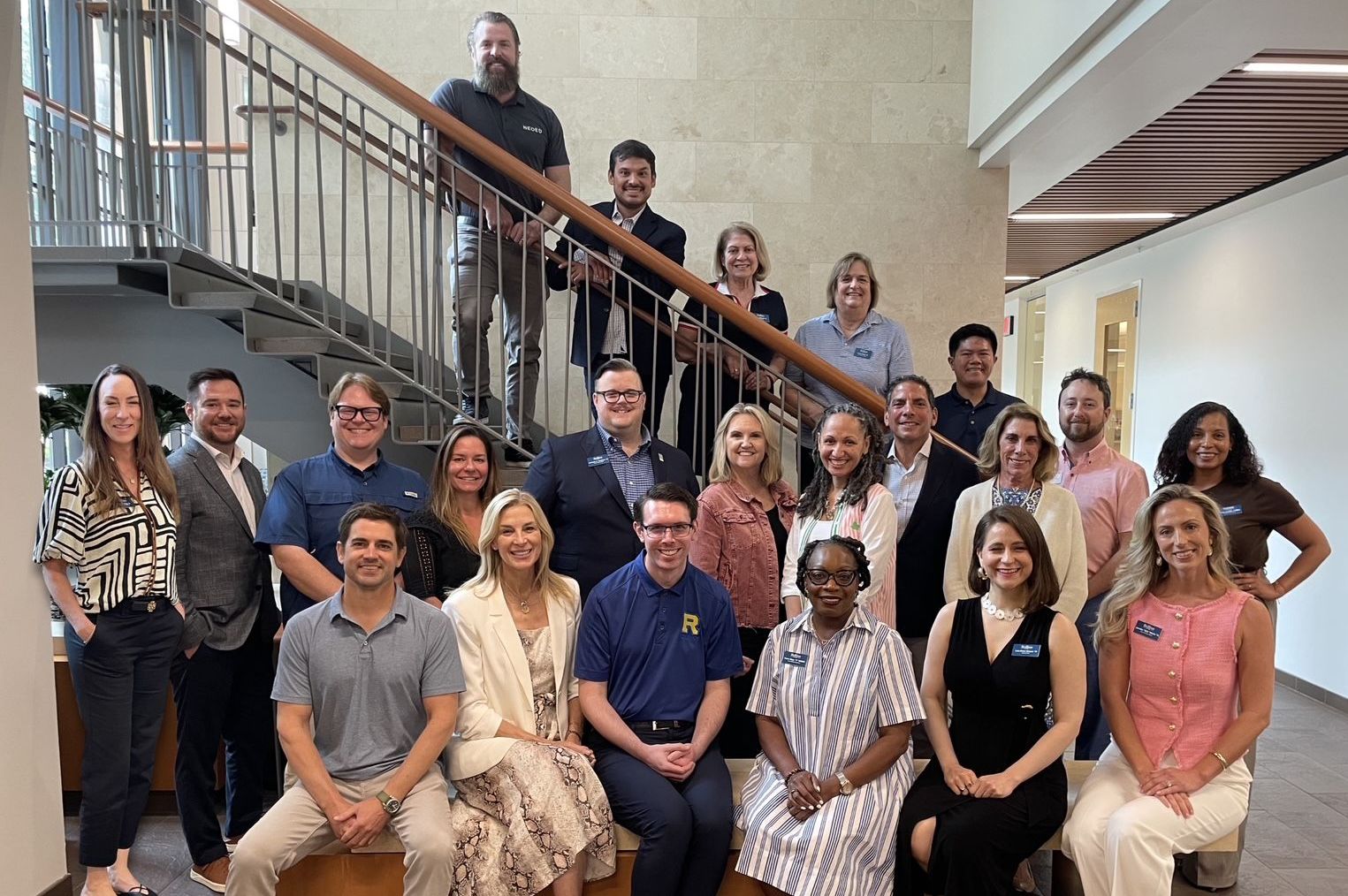 The Executive Committee of the alumni board, outside on the lawn at Rollins College