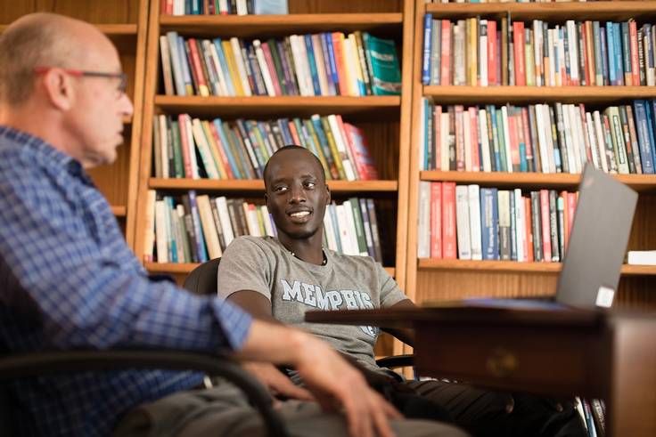 Isaac James ’19 and one of his mentors, political science professor Don Davison.
