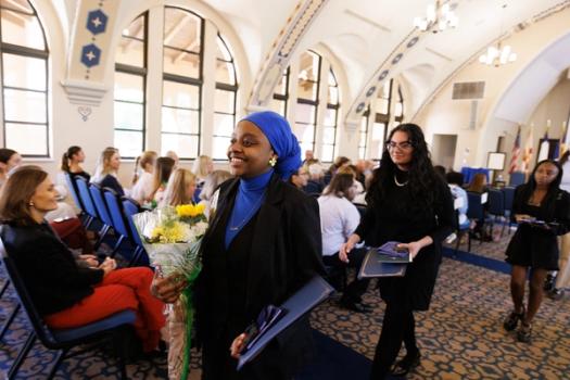 Students smiling as they are initiated into Phi Beta Kappa at Rollins College