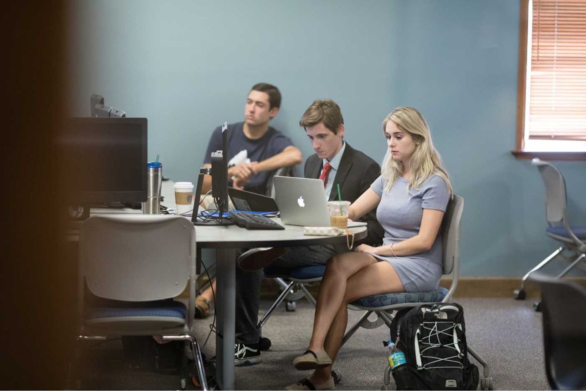 Business students working on computers.