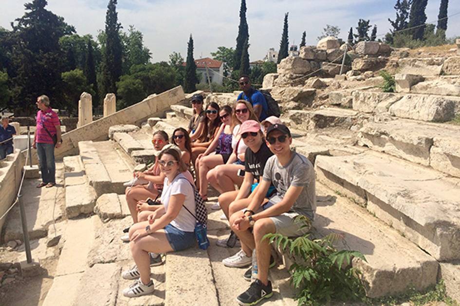 A group of Rollins College students pose while studying abroad in Greece.