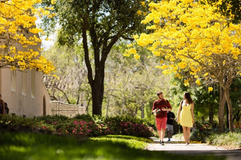 Two students walking through campus.