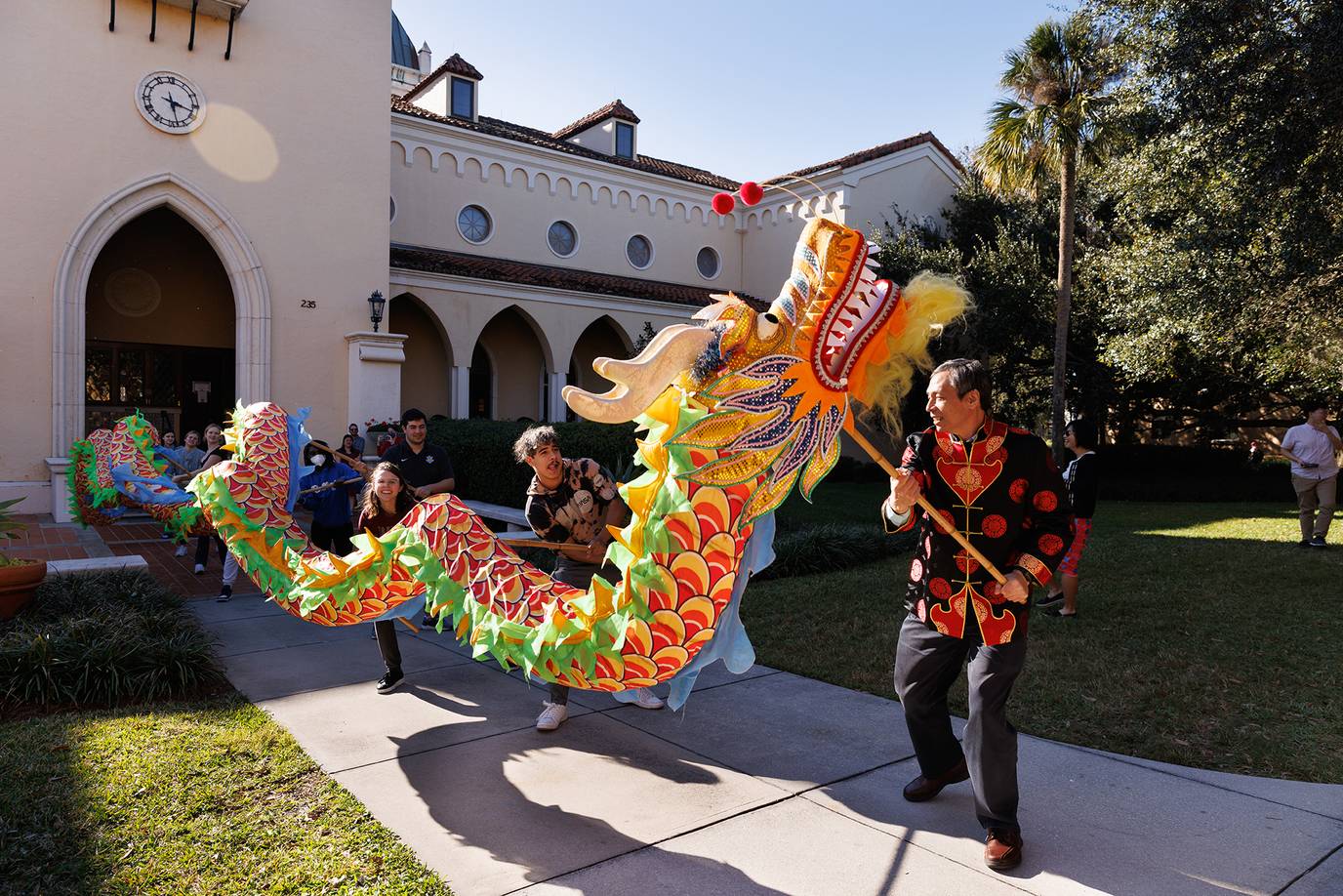 Rollins professors and students do the Chinese Dragon Dance in celebration of the Lunar New Year.