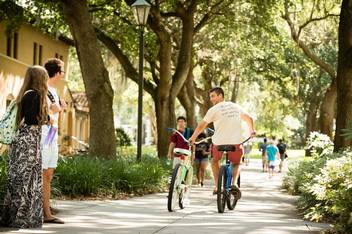 A student participating in Rollins' bike-share program.