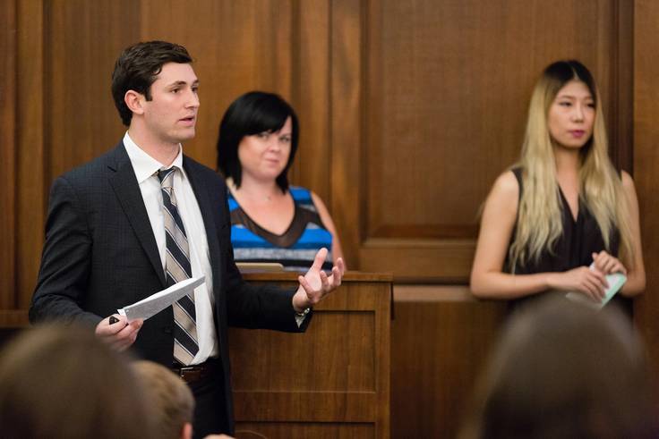 Rollins students presenting in class.