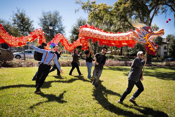 Students celebrate the Chinese New Year with a dragon dance on campus. 