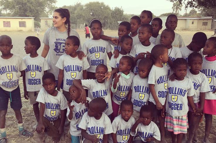 Kat Weiss ’19 pictured with local Tanzanian children she met during a field study.