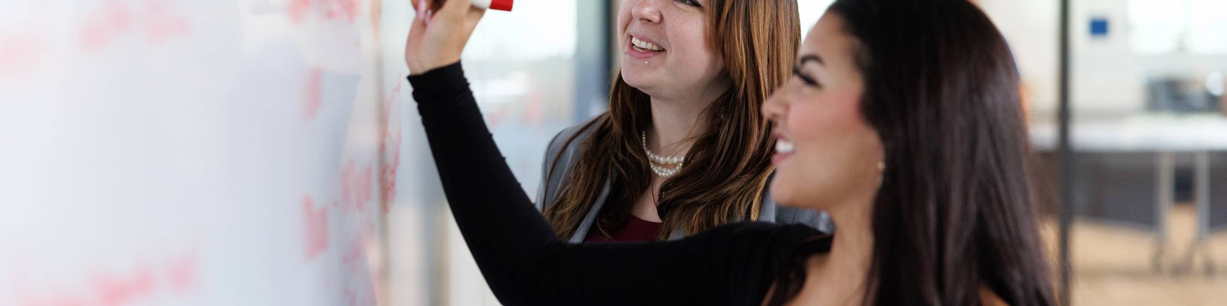 An admission counselor leads an information session at Rollins.