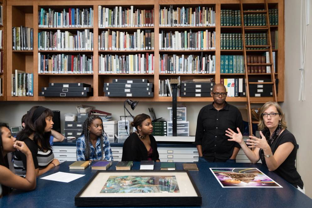 Professor Chambliss and students discussing art in the CFAM.