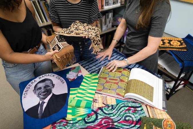 Students researching African art for original exhibition.