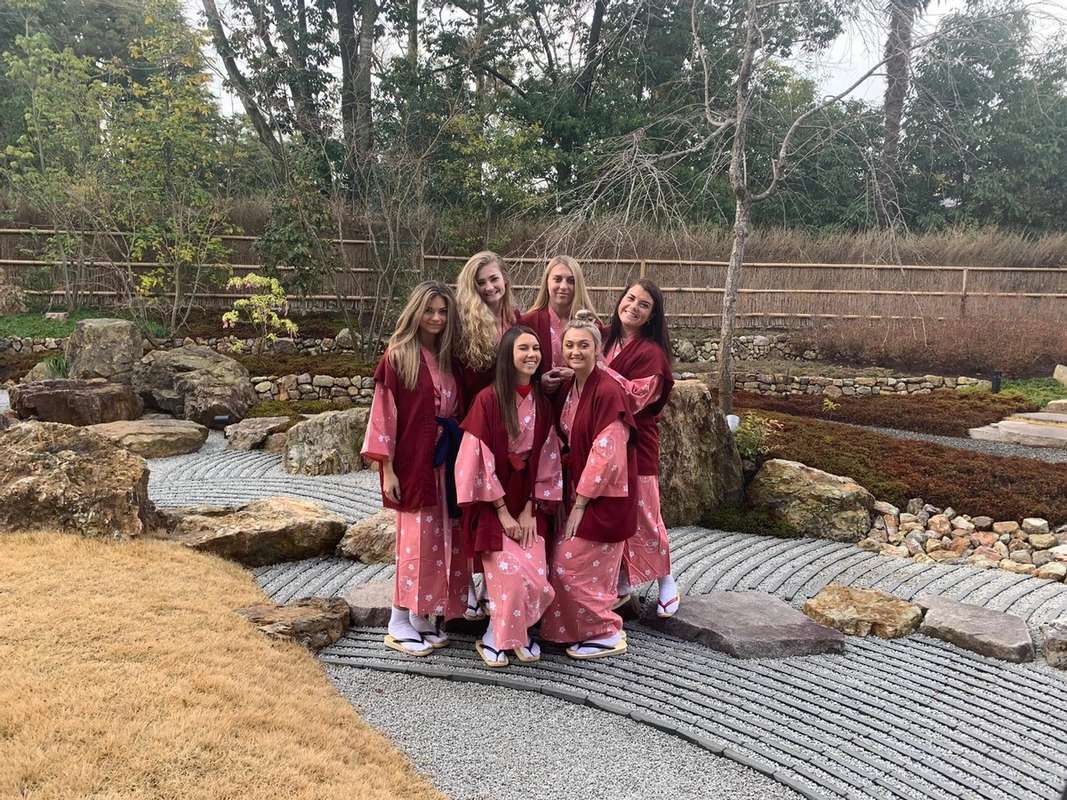 Rollins students dressed in authentic kimonos on a field study to Japan.