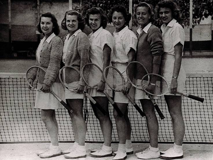 Shirley Fry Irvin ’49 pictured on the tennis court at Rollins College with five of her teammates.