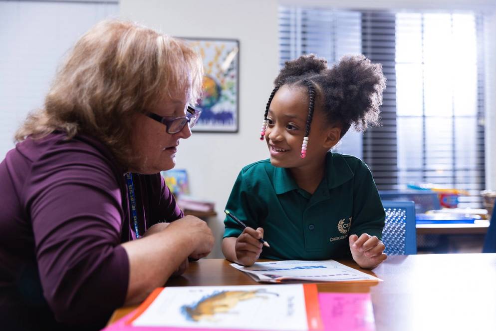 Student at teacher at the Hume House Child Development & Student Research Center