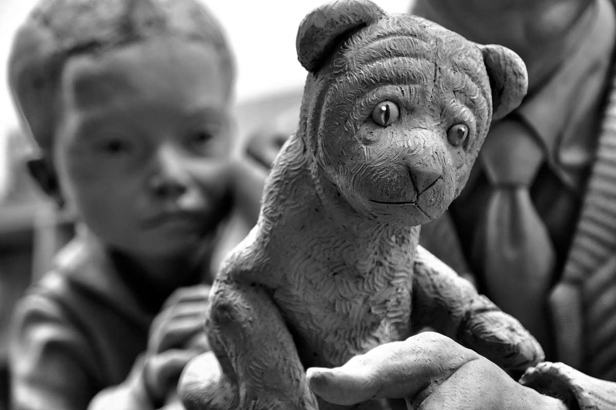 Black and white photo of Daniel Tiger, one of the puppets depicted in the sculpture by Paul Day honoring Mister Rogers. 