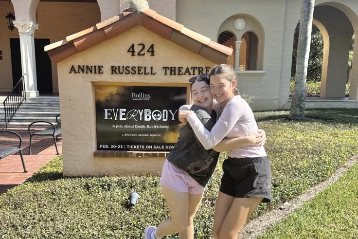 Ava Bartolomucci and friend in front of the Annie Russell Theatre