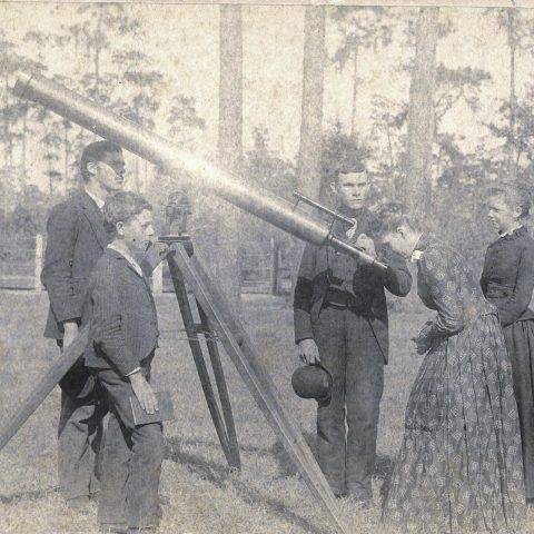 Science professor Eva J. Root leads an astronomy class in 1890.