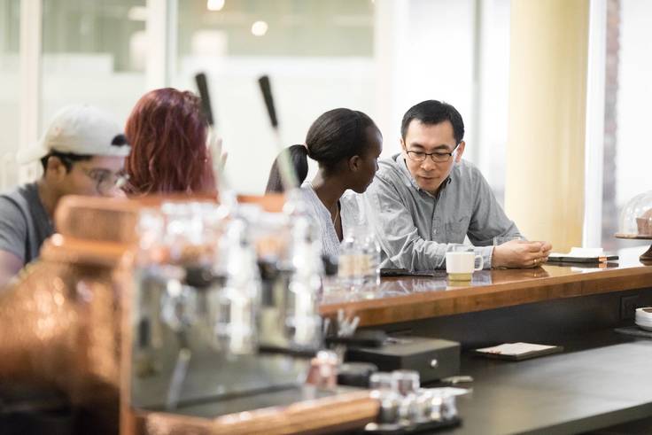 Economics professor and his students work with community partner, Downtown Credo, a local coffee shop.