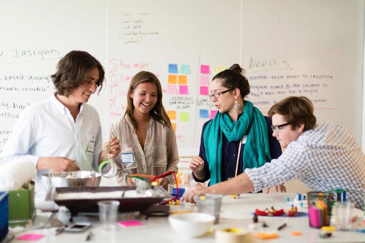 Social entrepreneurship students brainstorm ideas in AdventHealth's Innovation Lab.
