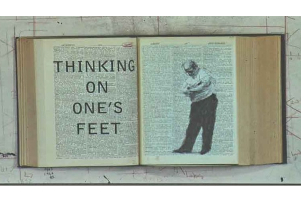 Image of a book open to a page with the words "Thinking on One's Feet" and an illustration of a man standing