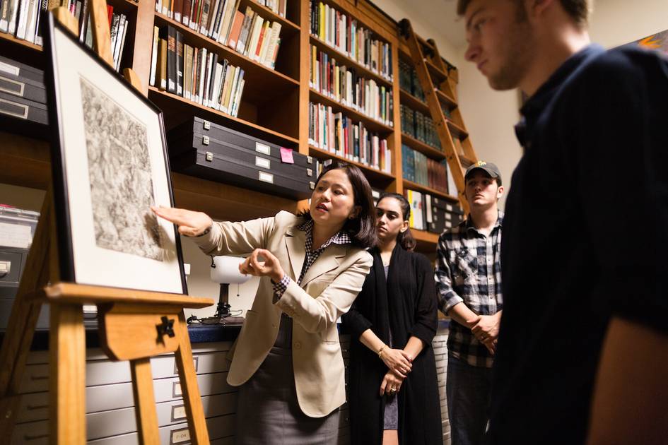 A professor discusses a portrait in a Rollins College art class.