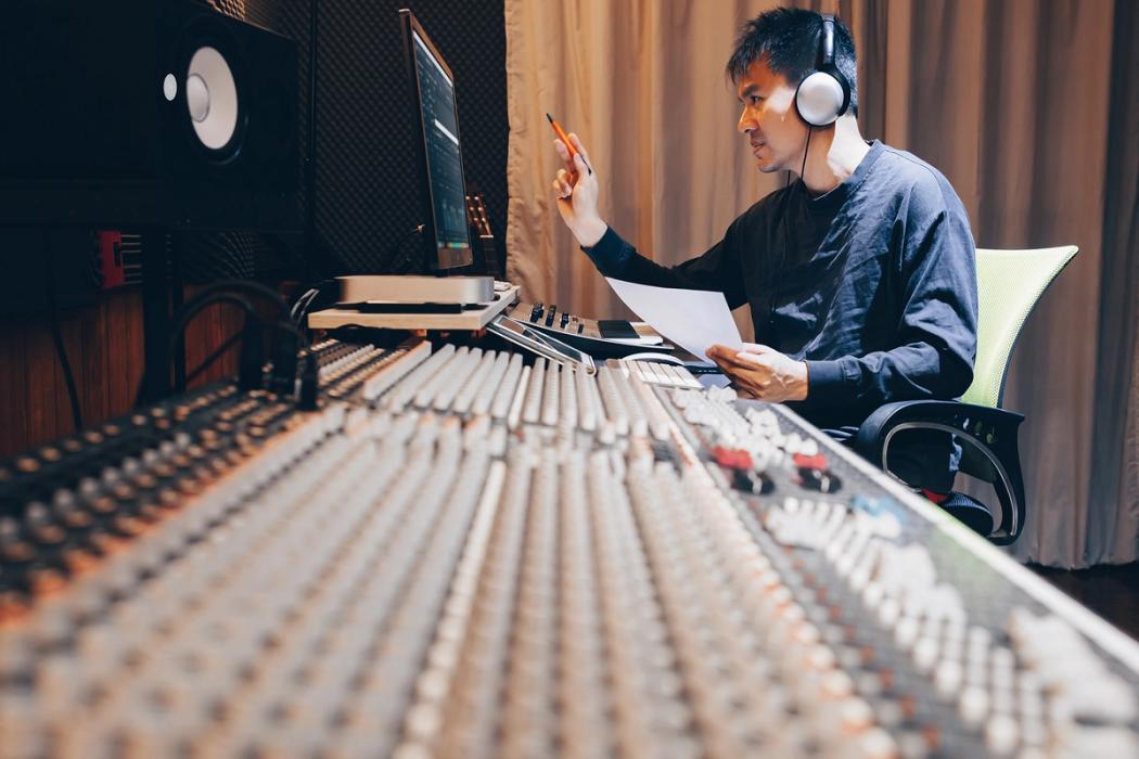 A sound engineer works on a recording.