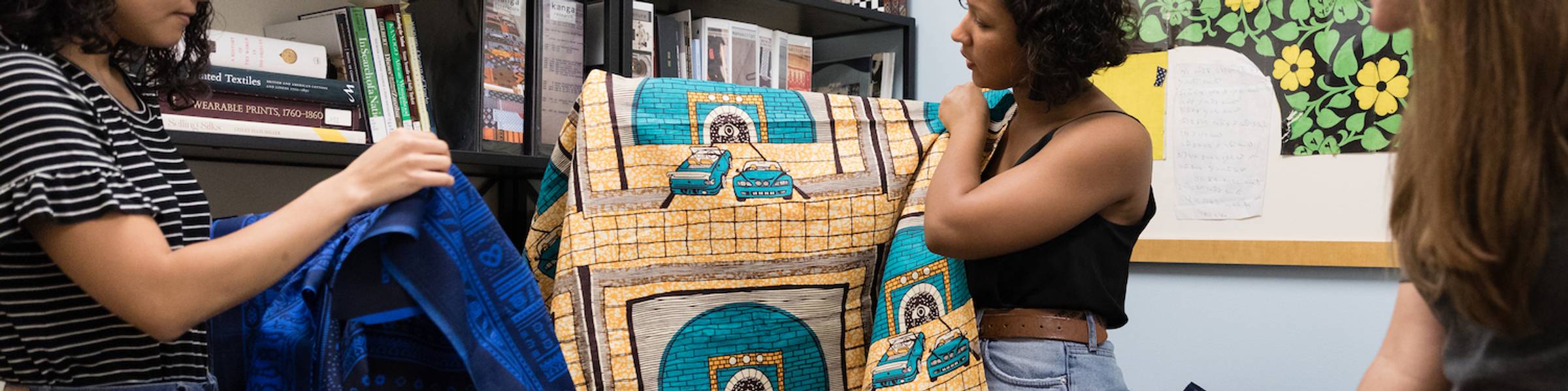 Rollins students study an African textile in class.