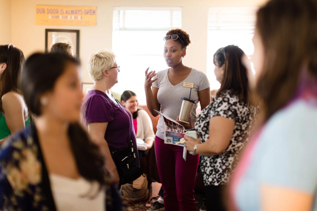 People talking during a networking event