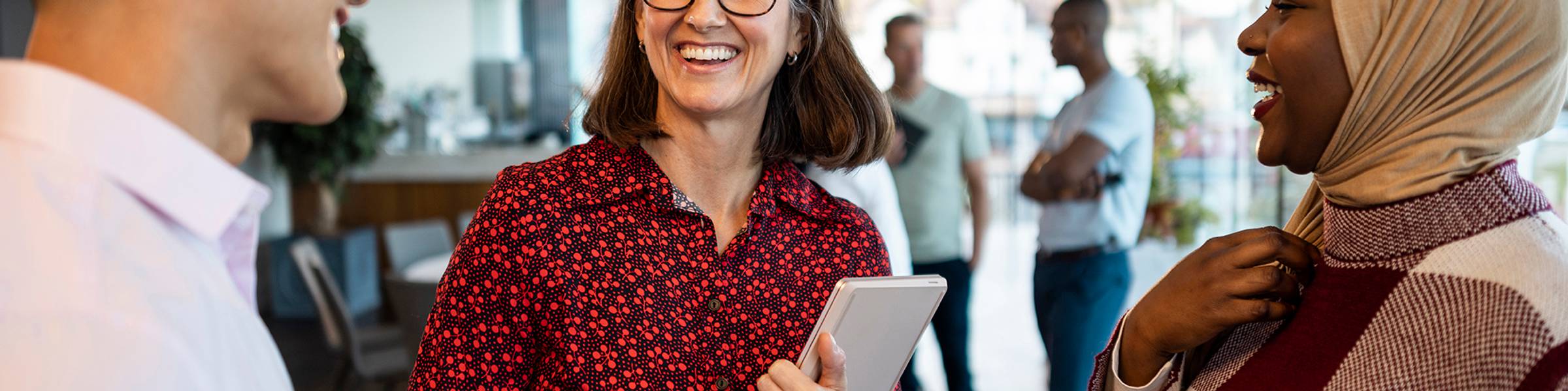 A professional meets with colleagues.