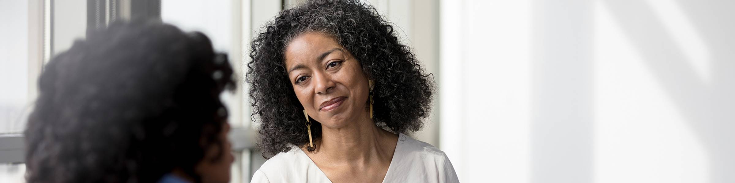 A wellness counselor meets with a client.