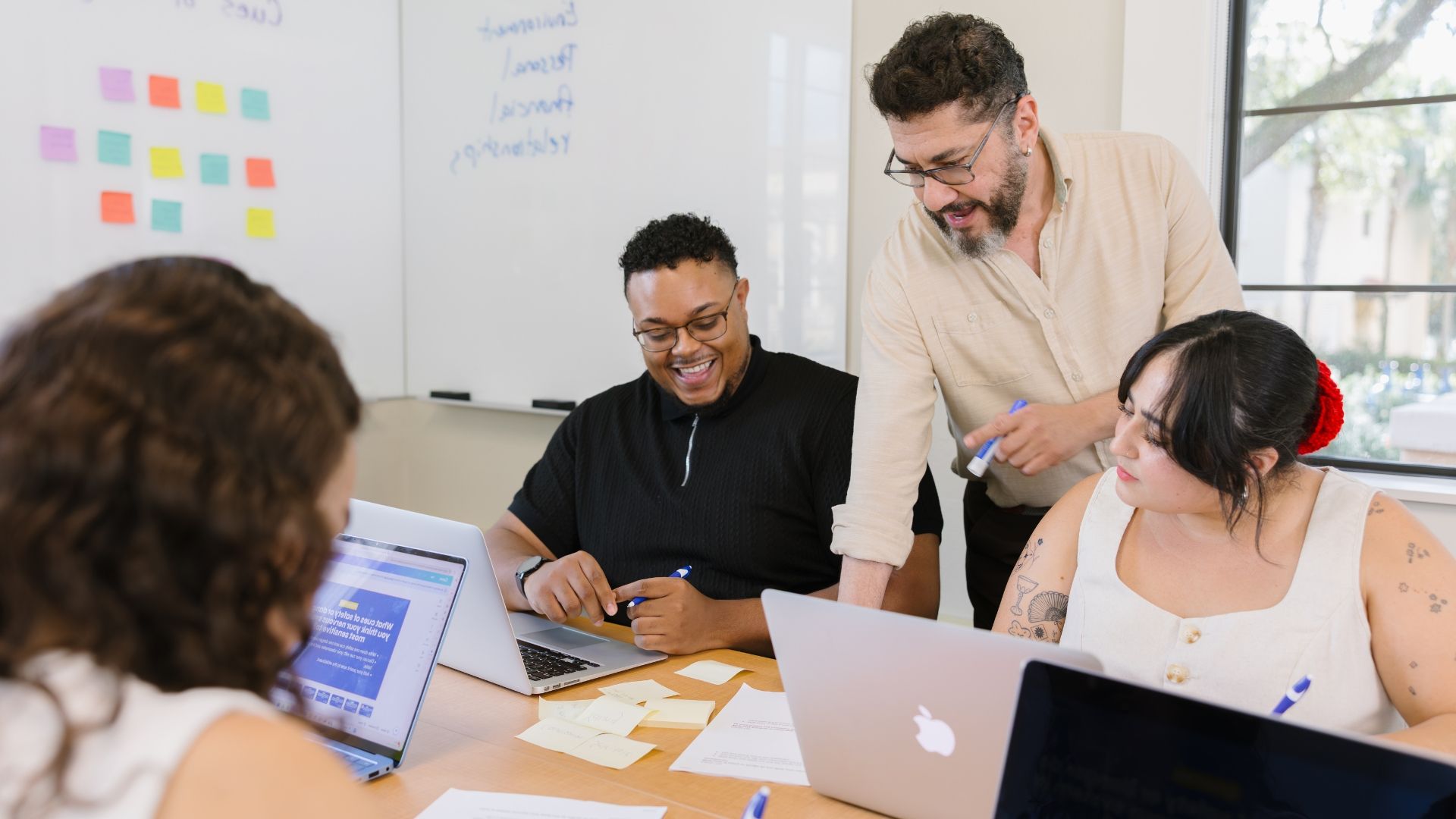 A mental health counselor meets with a client.