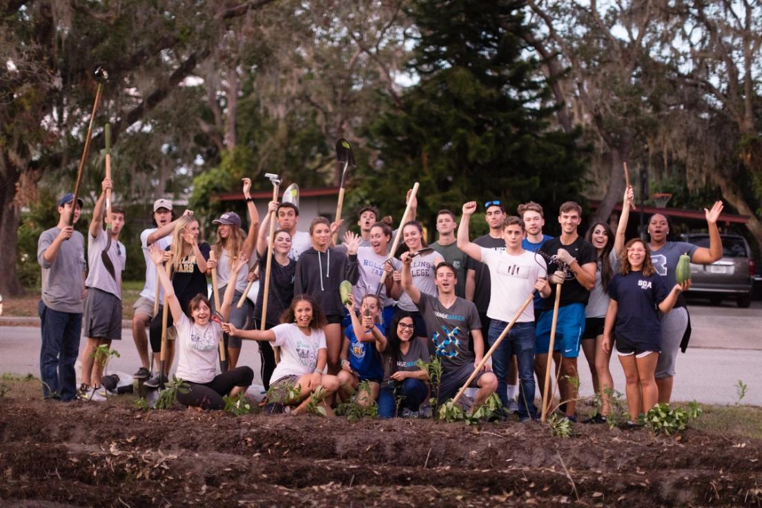 Volunteers pose for a group photo.