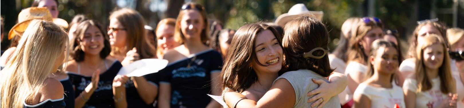 Sorority members celebrating Bid Day. 