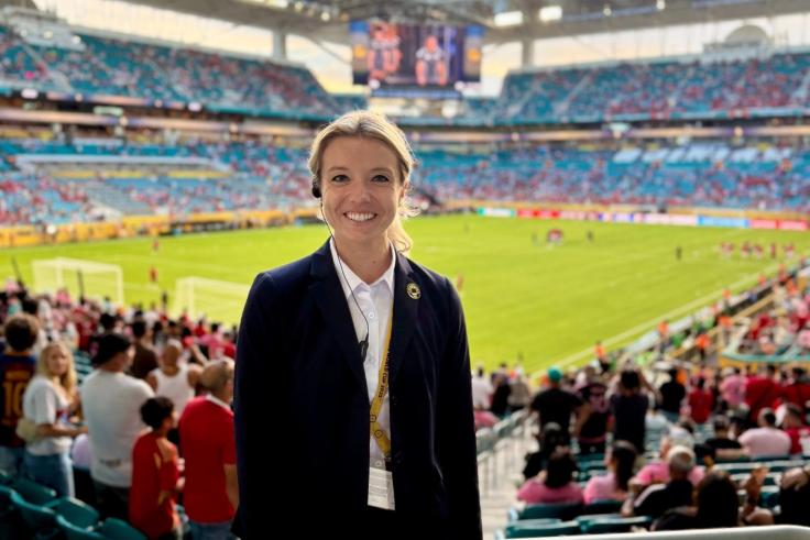 Morgan Colley in front of a soccer field