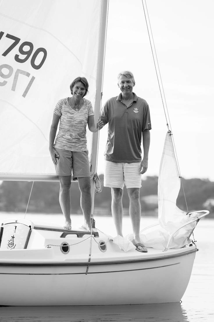 Rollins President Grant Cornwell and his wife, Peg, on a sailboat on Lake Virginia.