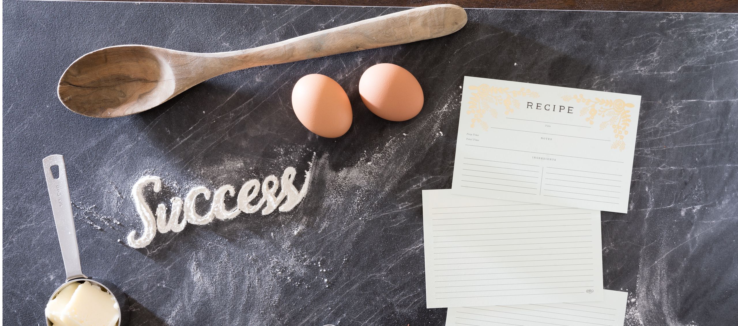 Recipe ingredients with the word Success spelled in flour