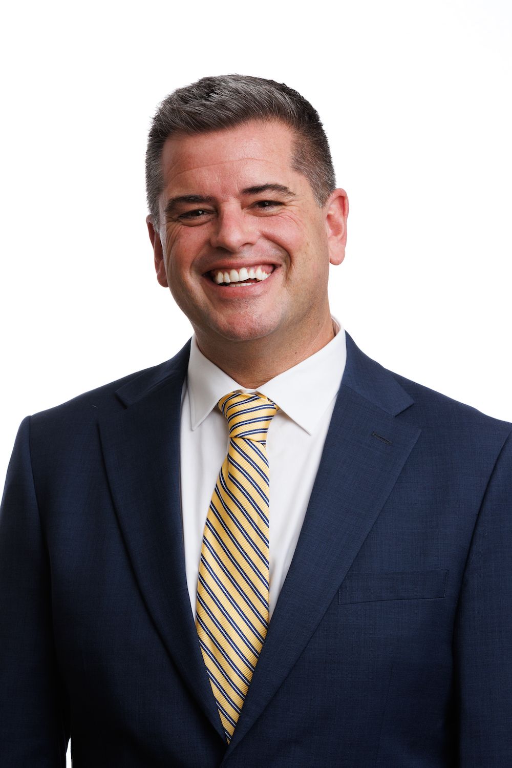 A professional headshot of Rollins College professor, Jason Surian.