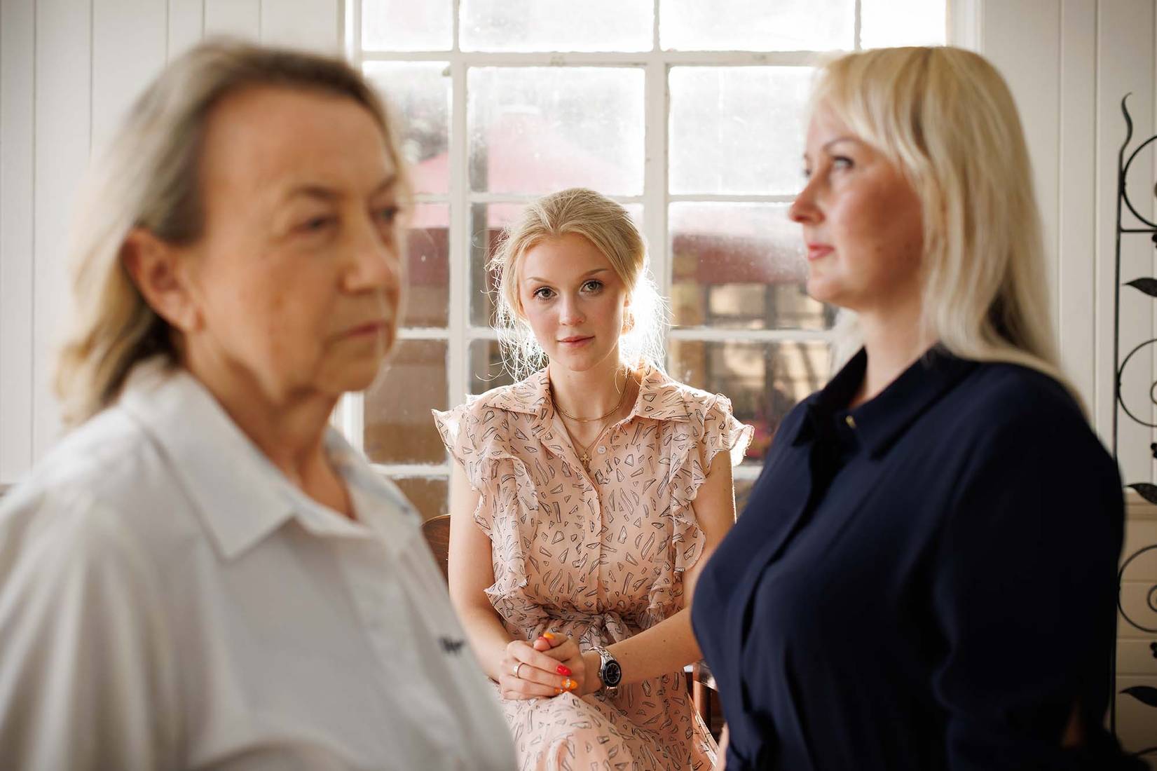 Mariia Shvydkina ’23 (center) with her grandmother Nina (left) and mother Elena (right).