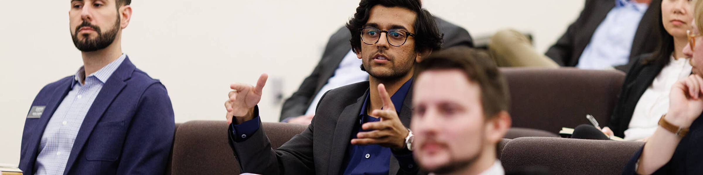 A group of MBA students collaborate on a project.