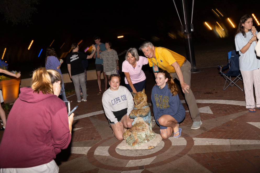Grant and Peg Cornwell with students and the Fox