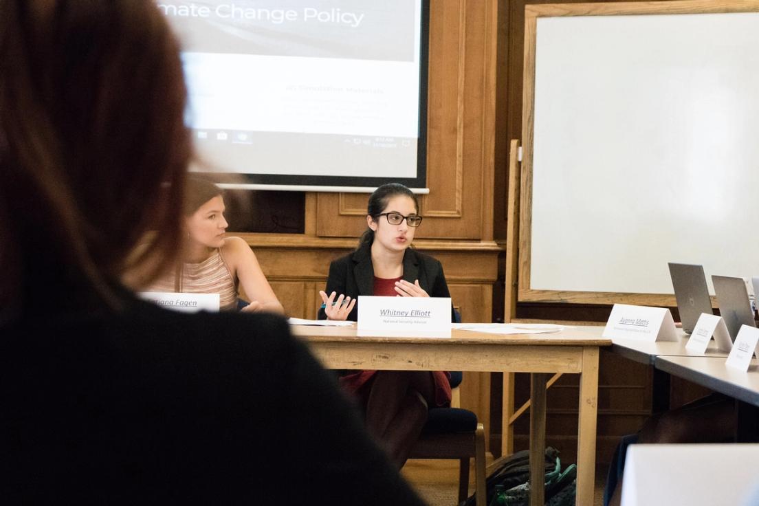 Rollins student speaking about climate change policy as part of a Model UN.