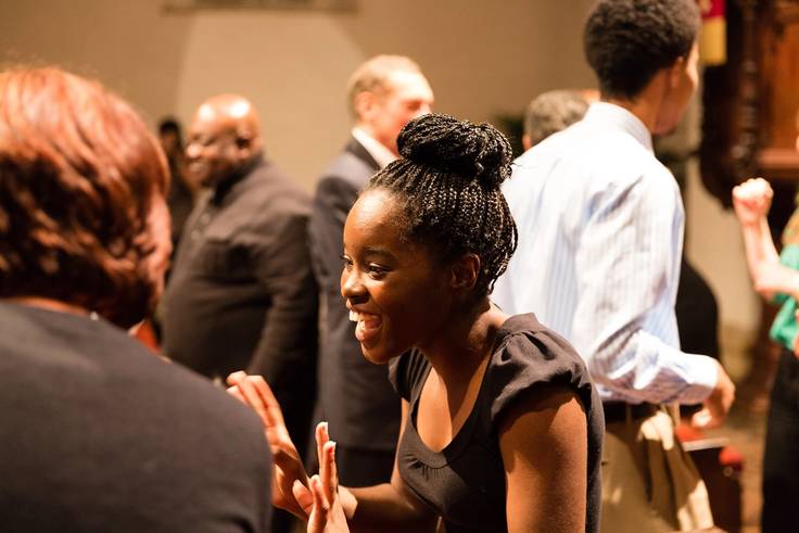 Student engaging in conversation during Rollins’ MLK week of celebration.