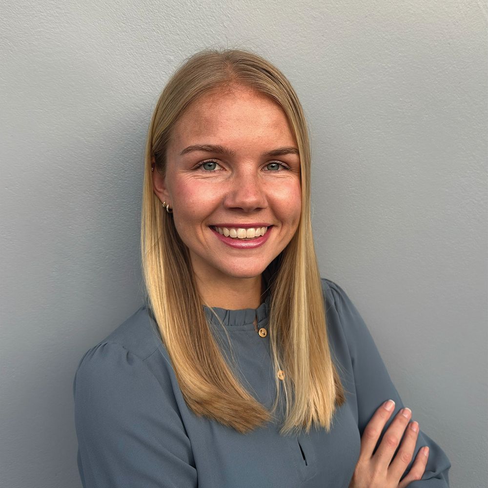 A portrait of Holly Denton, a graduate of Rollins College.