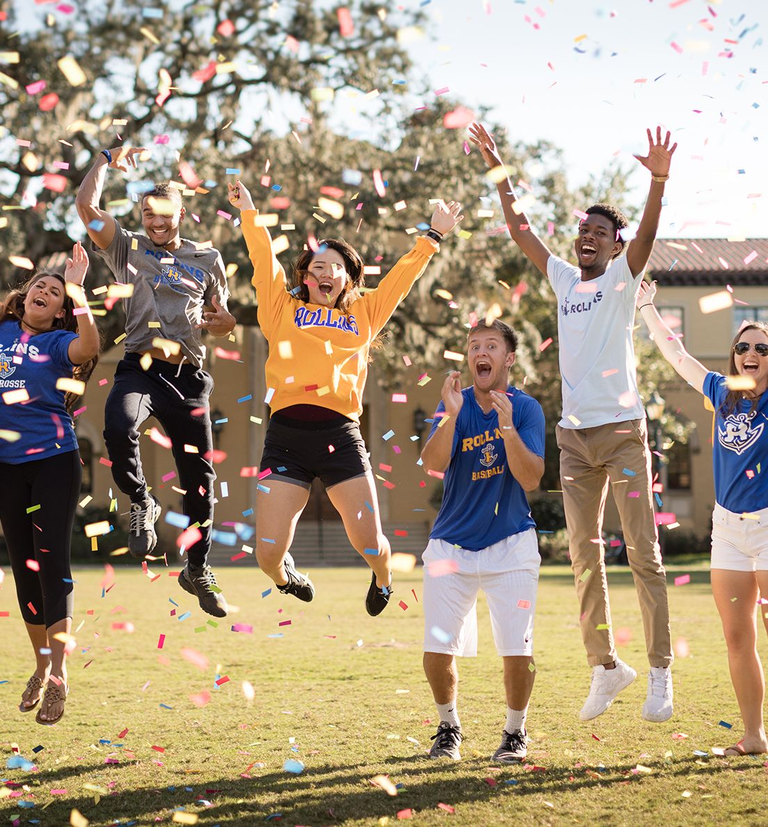 Rollins College students smiling at camera.