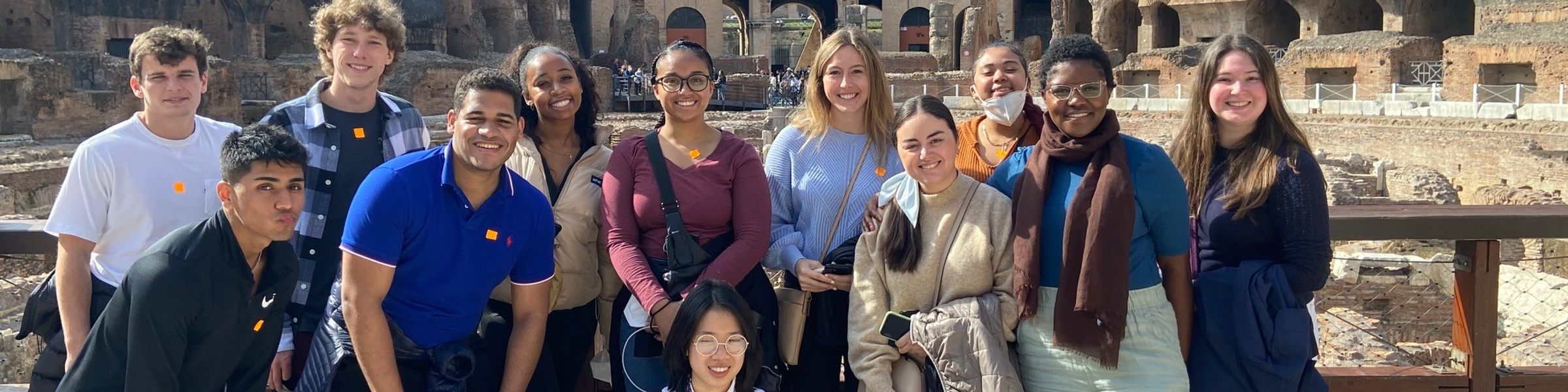 A group of Rollins students in the Roman Colosseum.