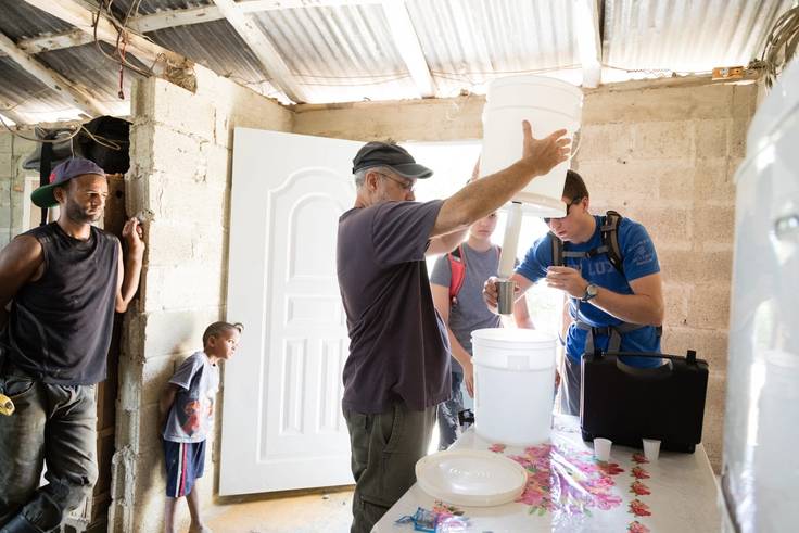 Rollins students install water collection systems in the Dominican Republic.